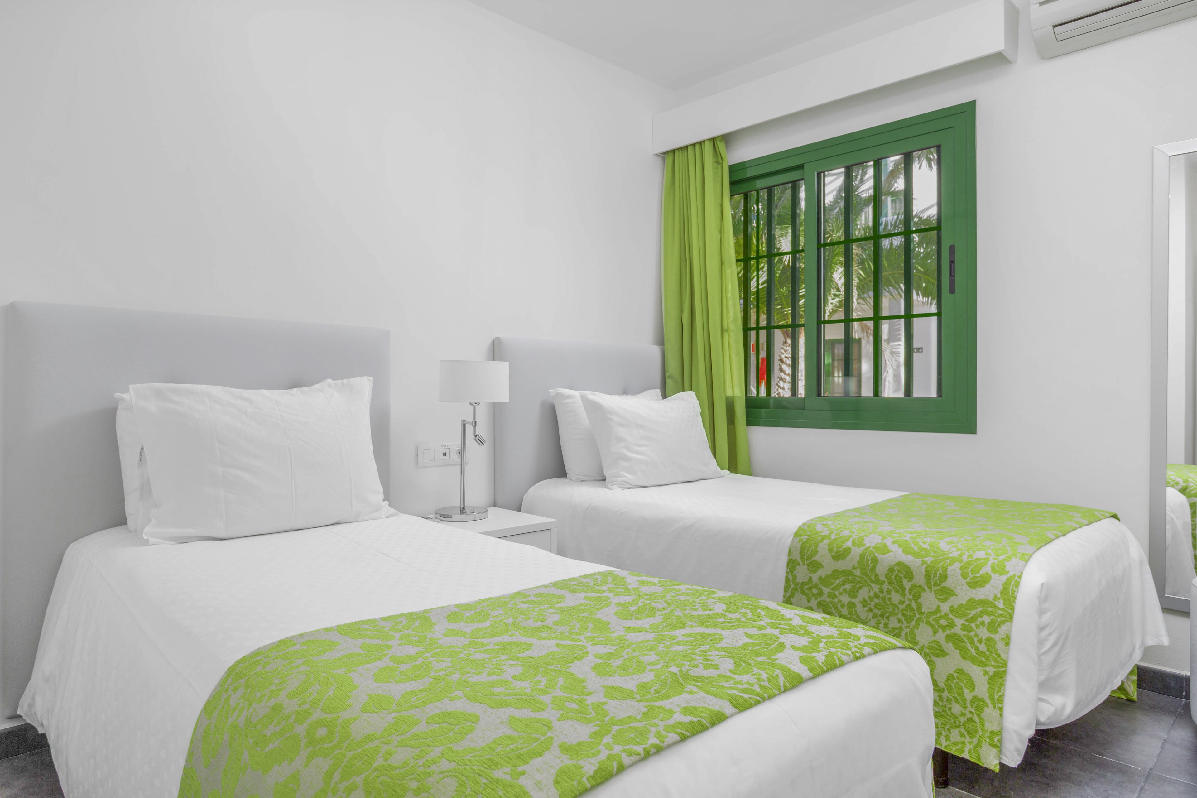 2 bedrooms, in-room safe, iron/ironing board, free cots/infant beds