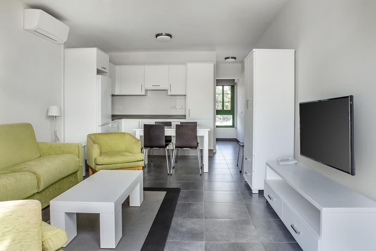 villa, 2 bedrooms | living area | 28-inch flat-screen tv with digital channels, tv