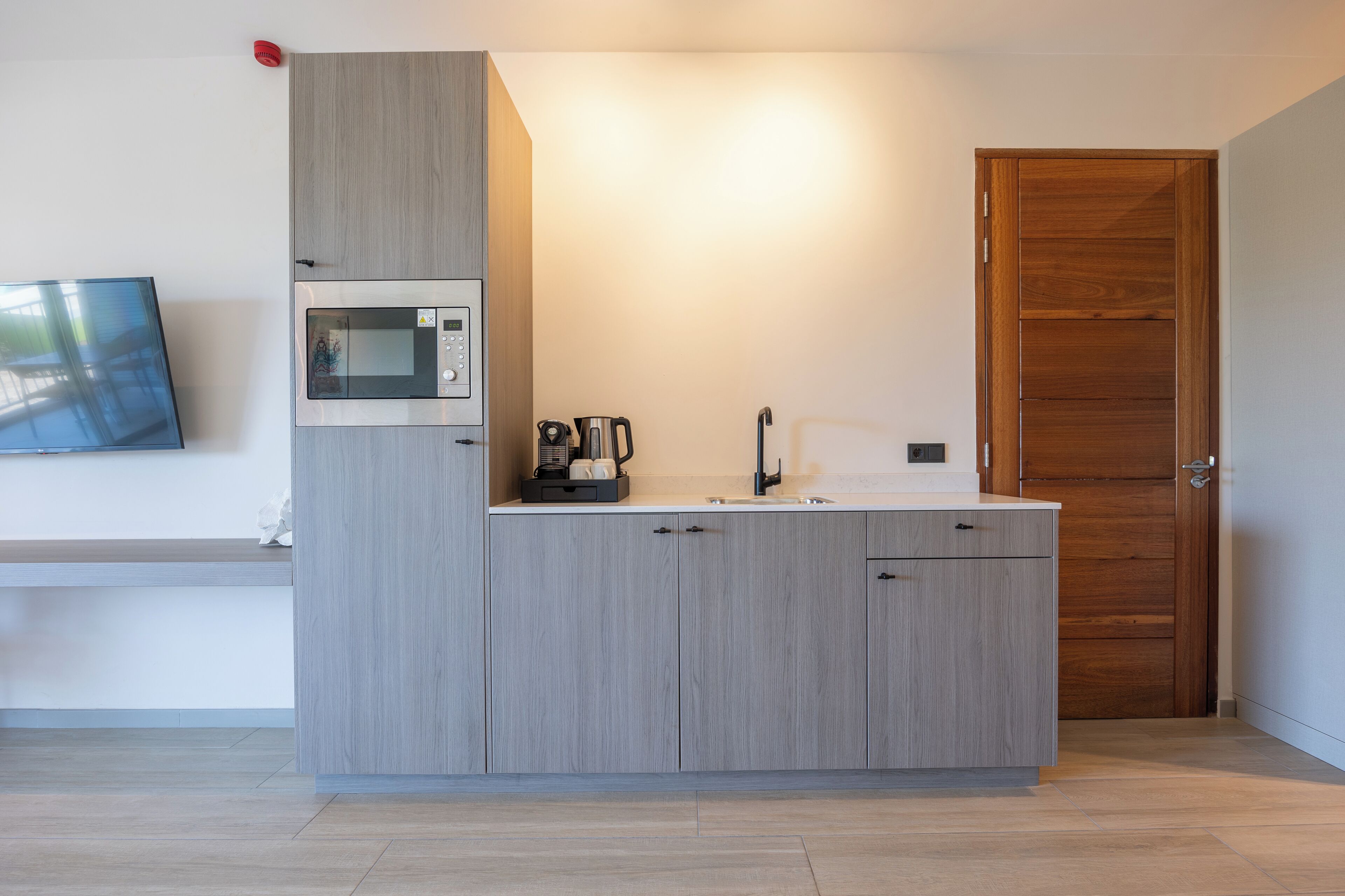 full-sized fridge, microwave, coffee/tea maker, electric kettle