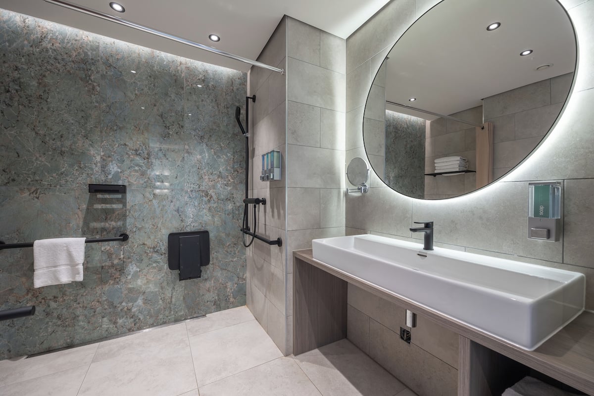 shower, designer toiletries, towels