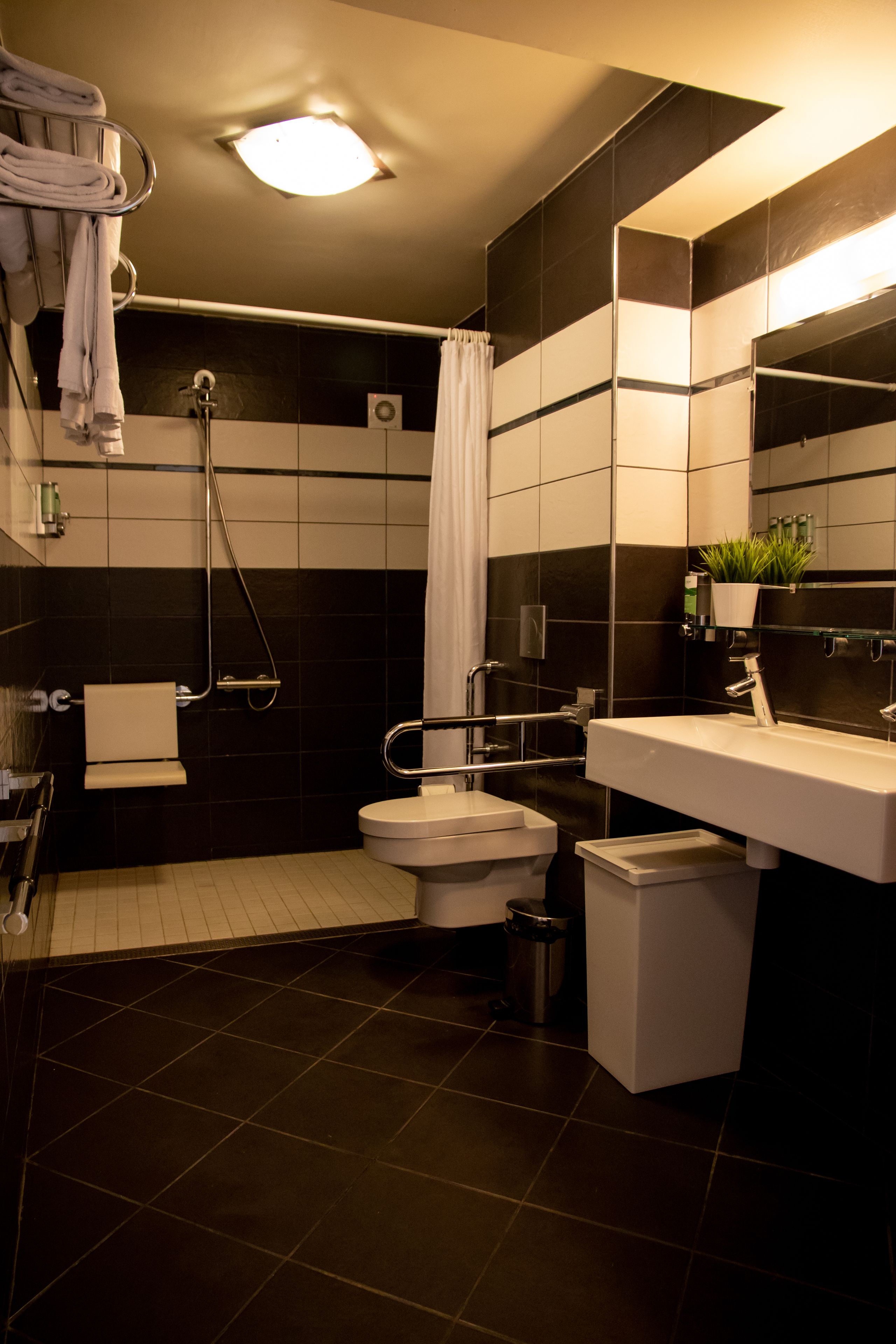 dolphin suite | bathroom | shower, designer toiletries, towels