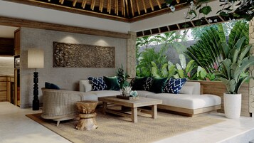 One Bedroom Pool Villa Royal Heritage | Living area | 50-inch Smart TV with satellite channels, Netflix, streaming services