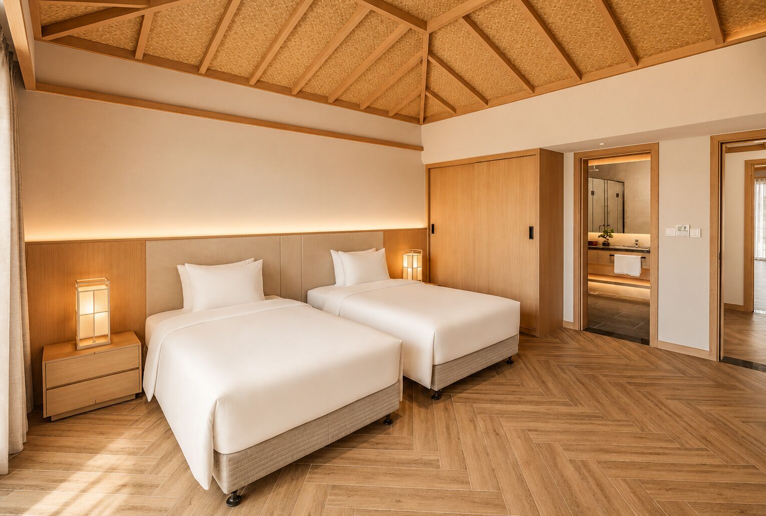 A hotel room with two beds, wooden flooring, a ceiling with wooden beams, and a visible bathroom with a mirror and sink.