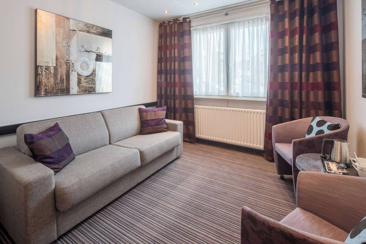 comfort room, 1 king bed | premium bedding, in-room safe, individually furnished, soundproofing