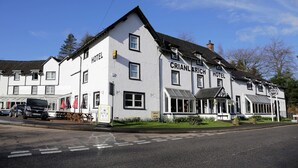 A two-story building with "HOTEL" signs on the side. - Best Western The Crianlarich Hotel (Crianlarich)