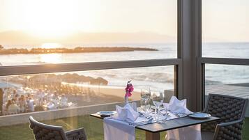 Breakfast, lunch, dinner served; beach views