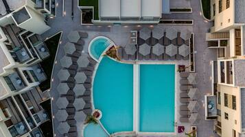 Outdoor pool, open 8:00 AM to 8:00 PM, pool umbrellas, pool loungers