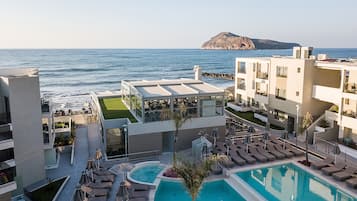 Outdoor pool, open 8:00 AM to 8:00 PM, pool umbrellas, sun loungers