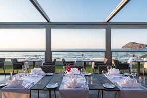 Breakfast, lunch, dinner served; beach views