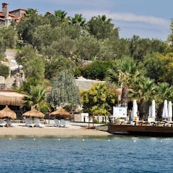 Private beach, white sand, free beach shuttle, beach cabanas