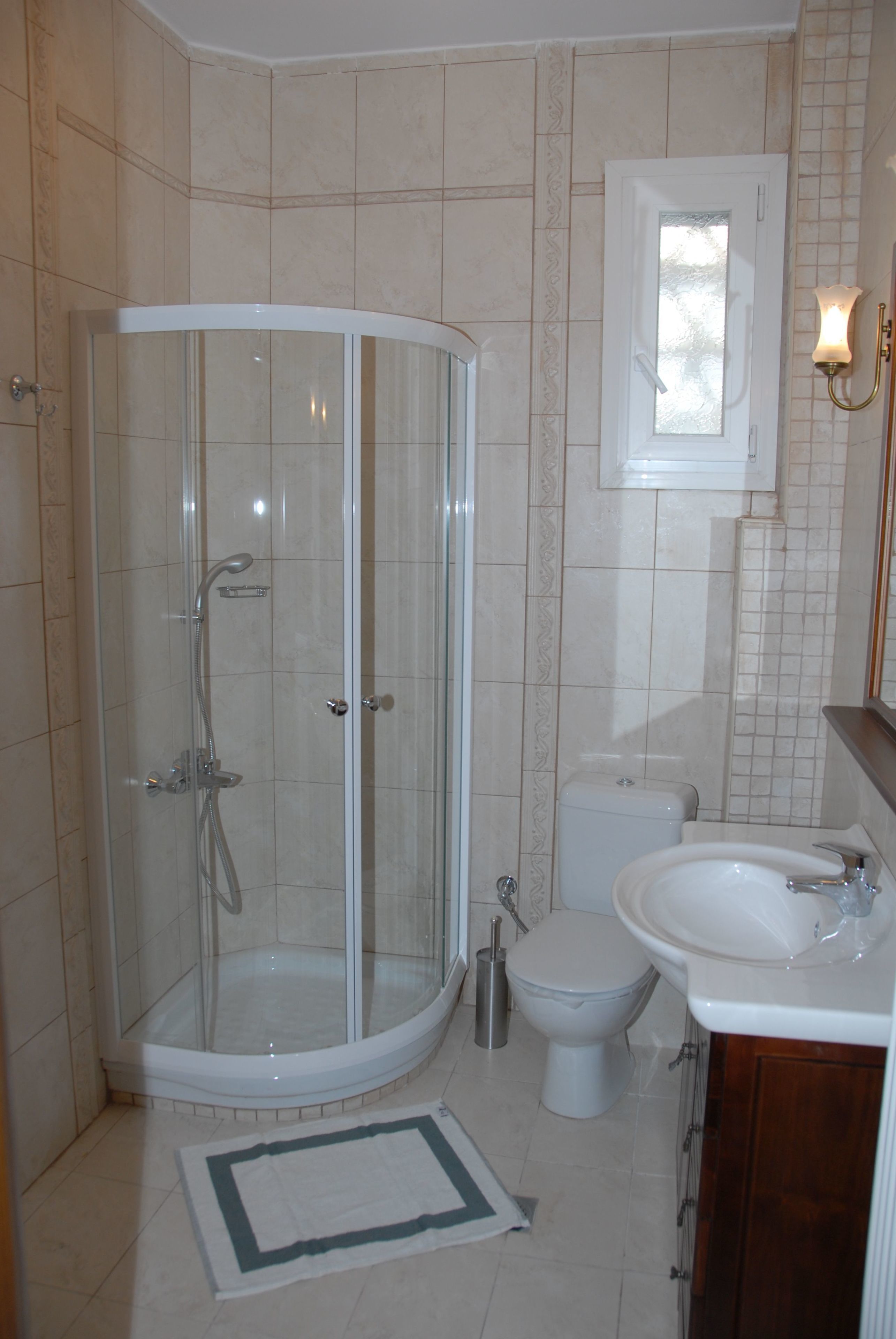 junior suite | bathroom | shower, free toiletries, hair dryer, dressing gowns