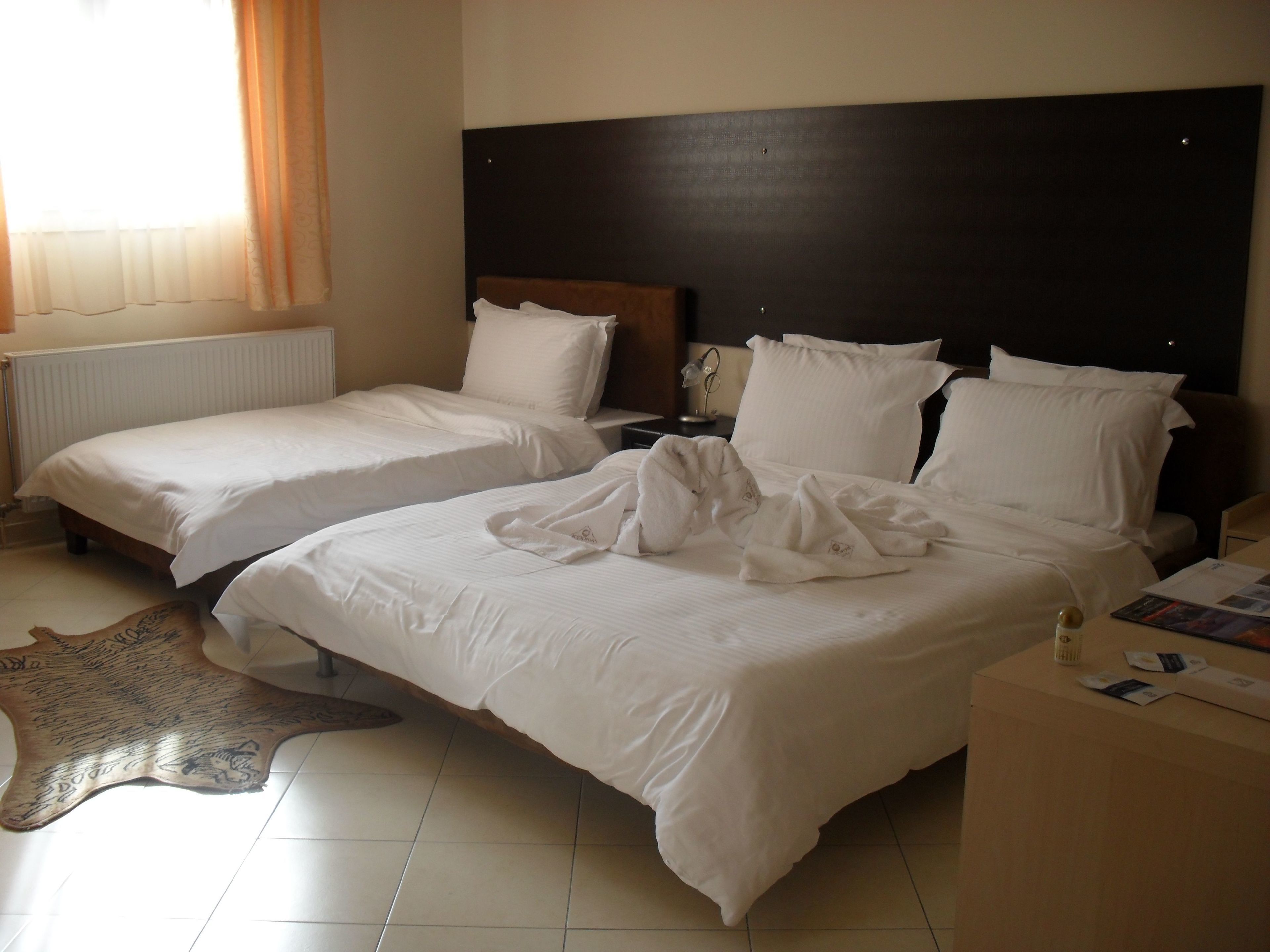 junior suite (triple) | egyptian cotton sheets, premium bedding, down duvets, pillow-top beds