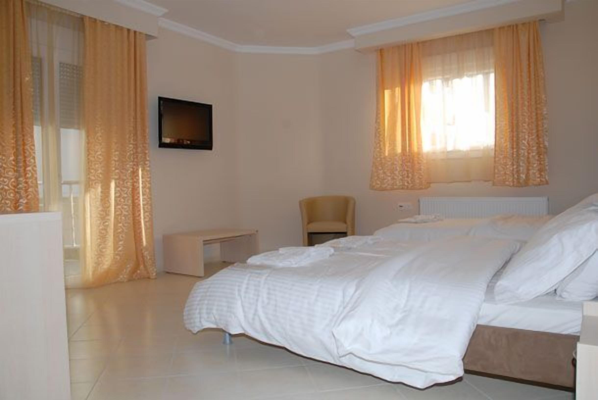 junior suite (triple) | egyptian cotton sheets, premium bedding, down duvets, pillow-top beds