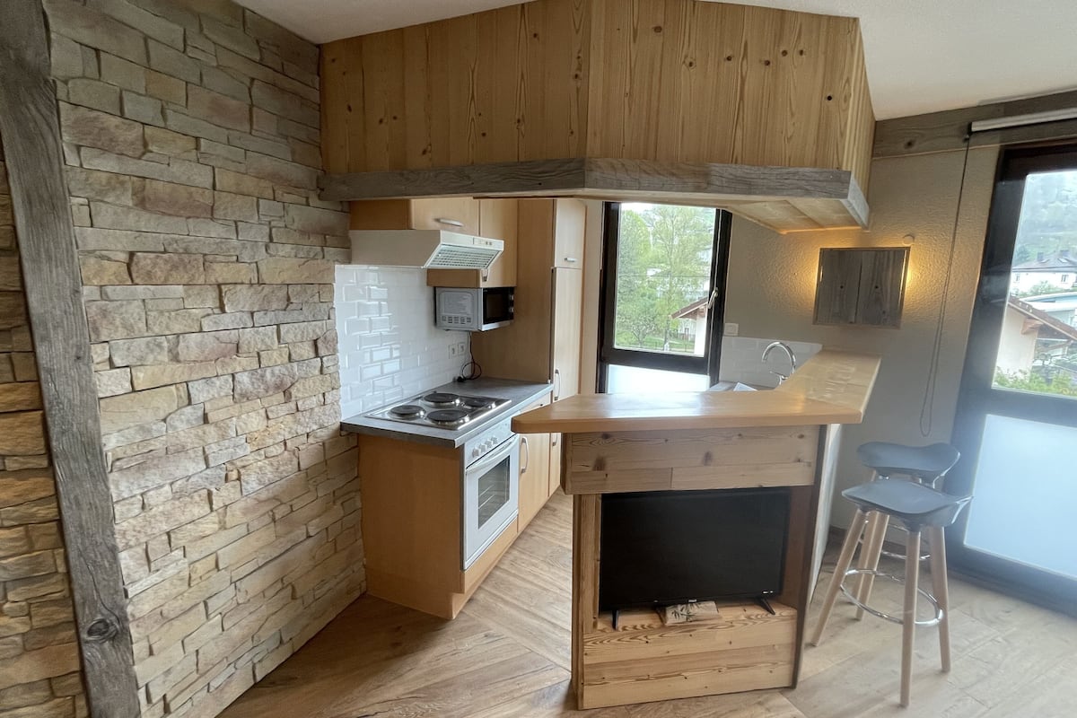 flat-screen tv, table football, ping pong, books