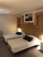 Premium bedding, pillowtop beds, desk, blackout drapes