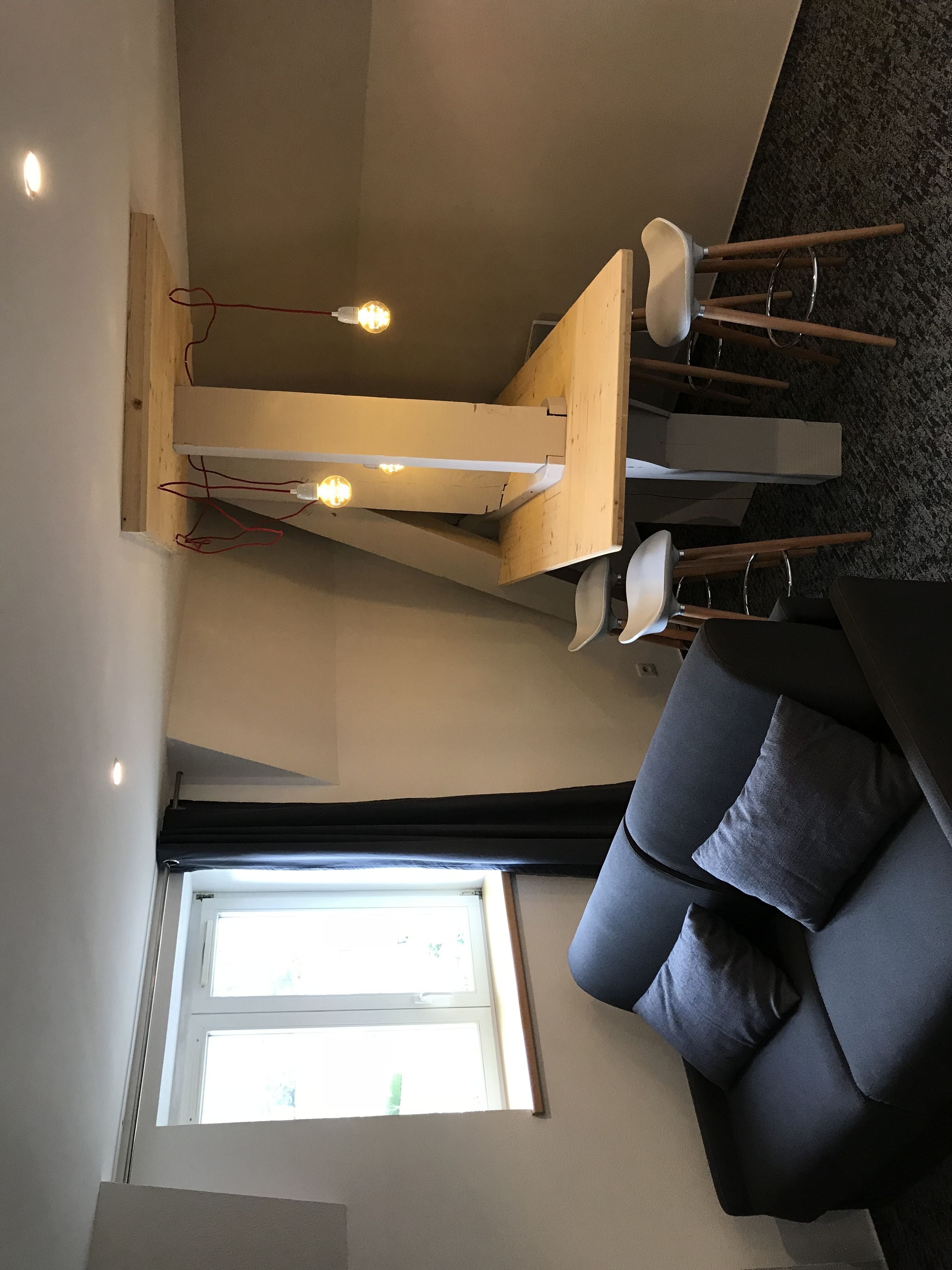 flat-screen tv, table football, ping pong, books