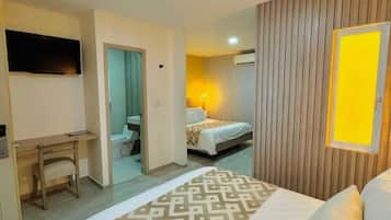 Twin Room | Minibar, in-room safe, desk, soundproofing