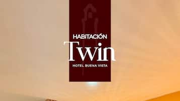 Twin Room | Minibar, in-room safe, desk, soundproofing