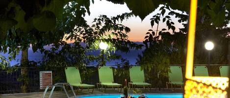 Outdoor pool, pool umbrellas, pool loungers