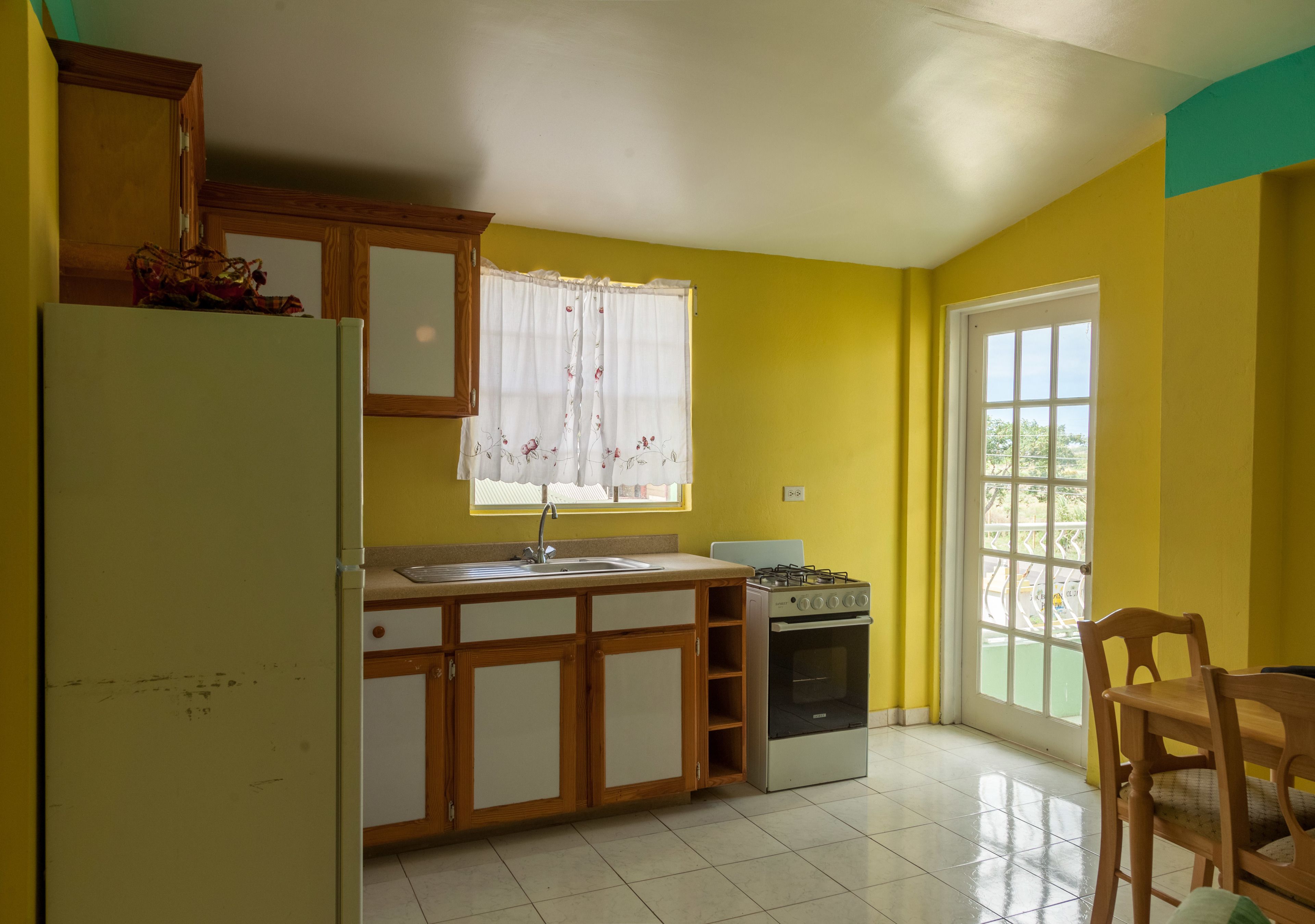 Premium Duplex, 1 Queen Bed | Private kitchenette