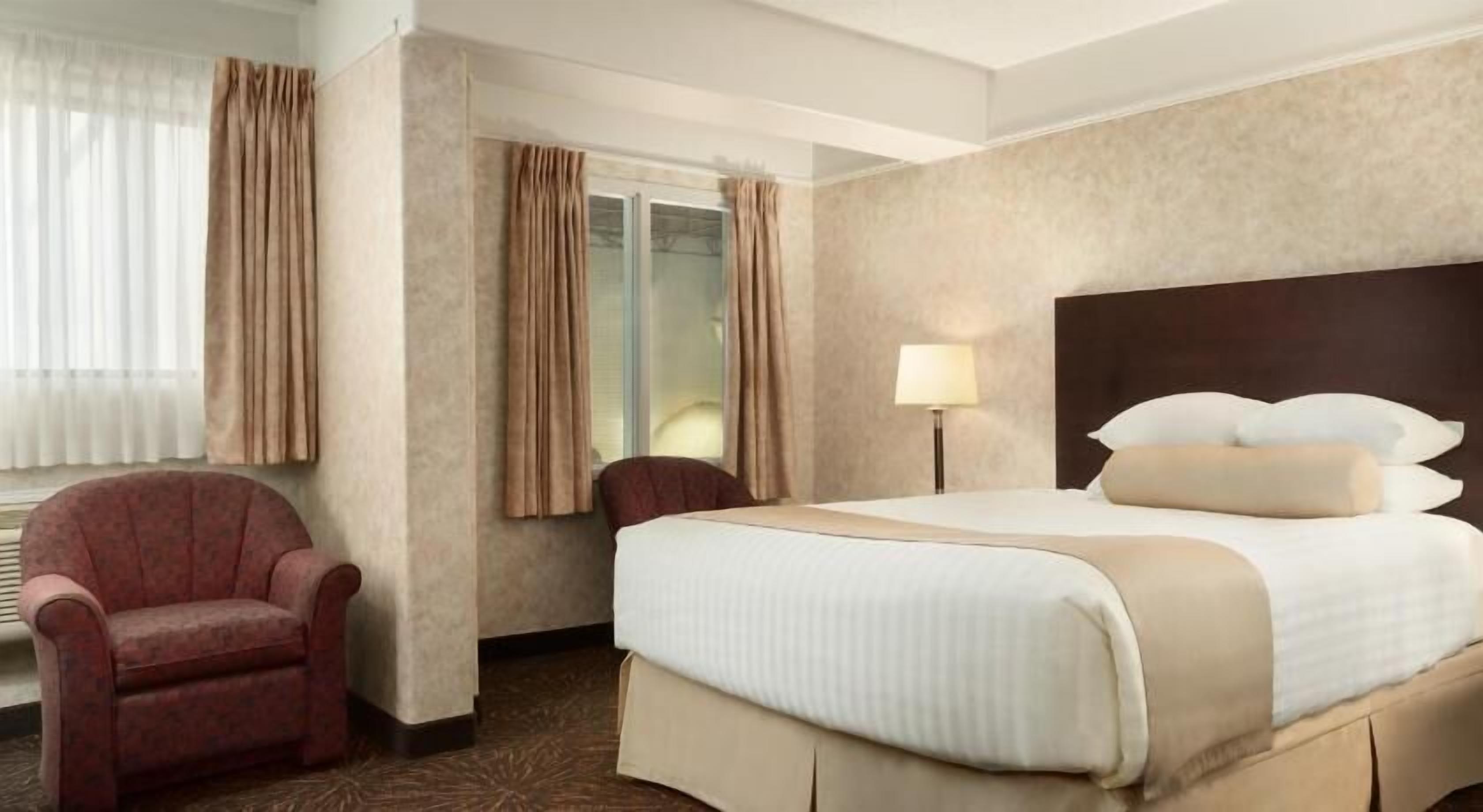 Pillow-top beds, desk, blackout curtains, iron/ironing board