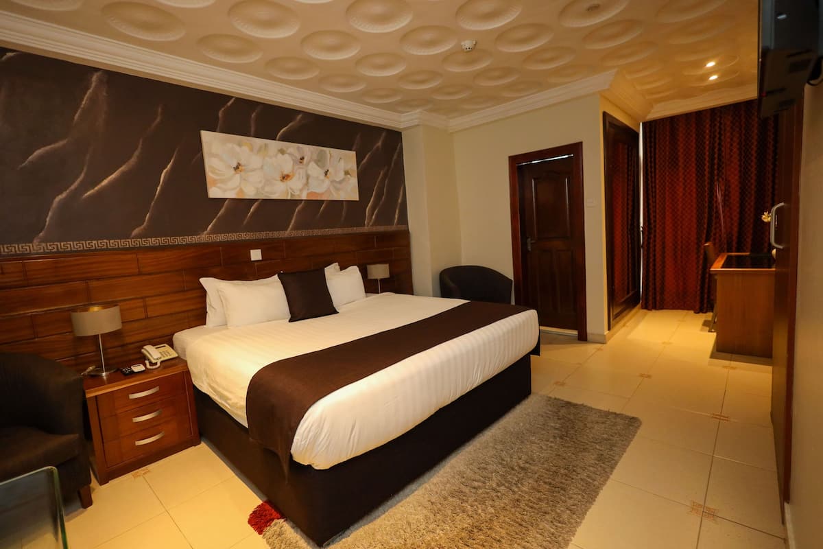 Deluxe Room | 1 bilik tidur, peralatan tempat tidur premium, bar mini 