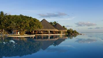 Outdoor pool, pool umbrellas, sun loungers