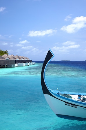 Private beach, white sand, sun loungers, beach umbrellas