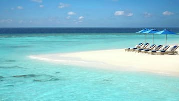 Private beach, white sand, sun-loungers, beach umbrellas