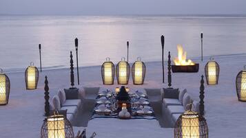 Private beach, white sand, sun loungers, beach umbrellas