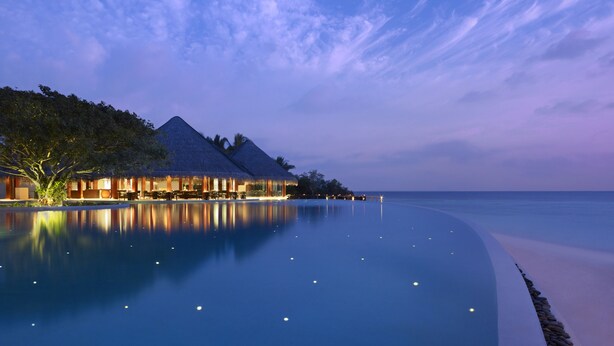 A resort with overwater bungalows, a infinity pool, and a beach view. - Dusit Thani Maldives - 50 percent off on Transfers for Stays of 5 Nights stay until 20 December 2026 (Mudhdhoo)