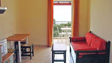 Apartamento, vistas al mar | Zona de estar