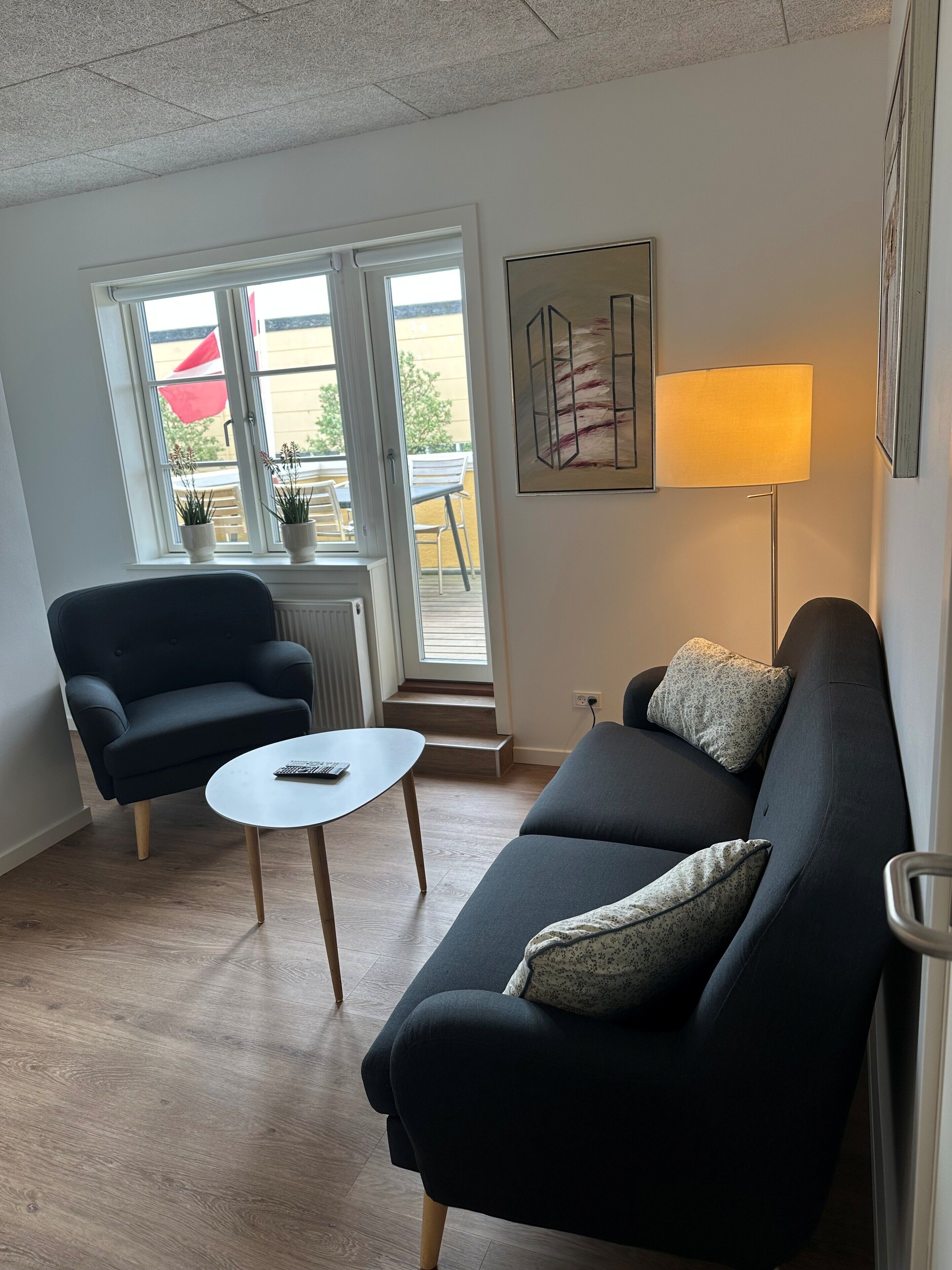 Apartment, 2 Bedrooms | Living area | 18-inch flat-screen TV with cable channels