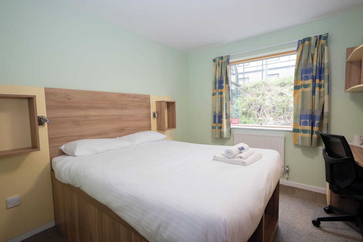 laptop workspace, iron/ironing board, free wifi, bed sheets