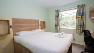 Laptop workspace, iron/ironing board, free WiFi, bed sheets