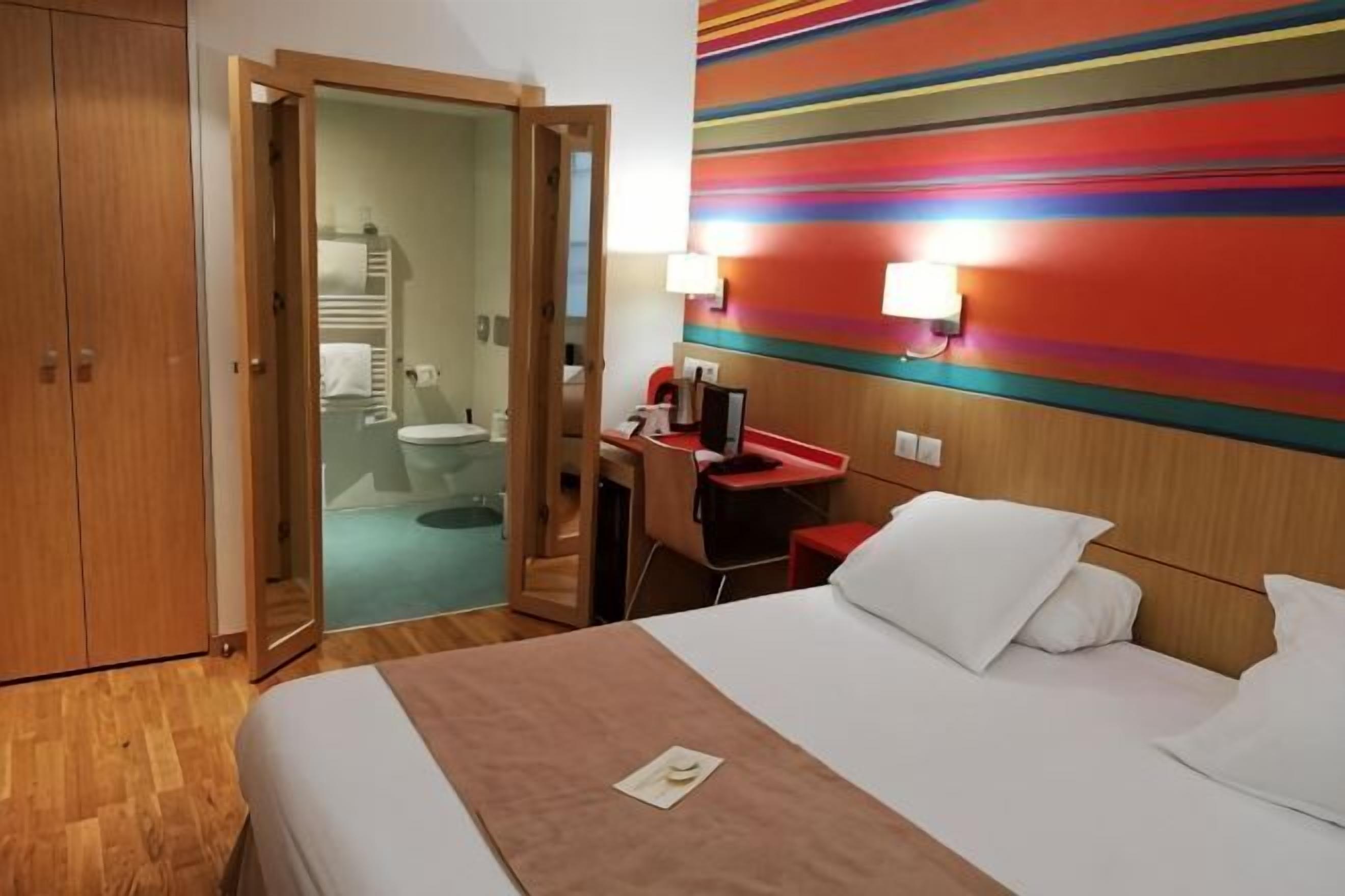 Premium bedding, in-room safe, desk, soundproofing