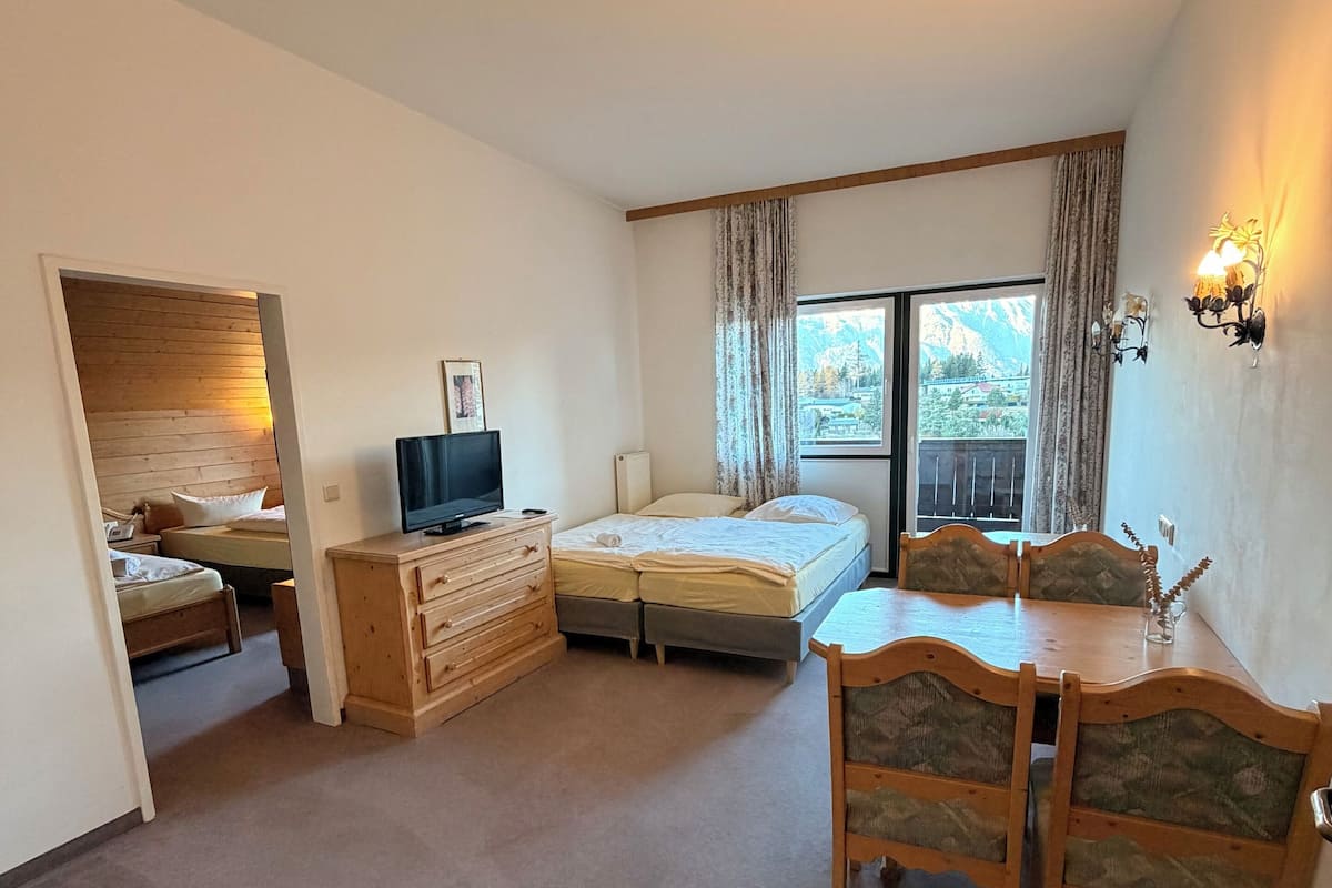 Family Suite, 2 Bedrooms, Balcony, Mountain View | 1 bedroom, individually decorated, individually furnished, soundproofing