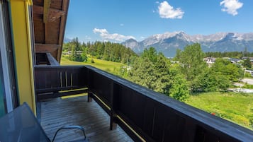 Standard Quadruple Room, Balcony, Mountain View | Individually decorated, individually furnished, soundproofing, free WiFi