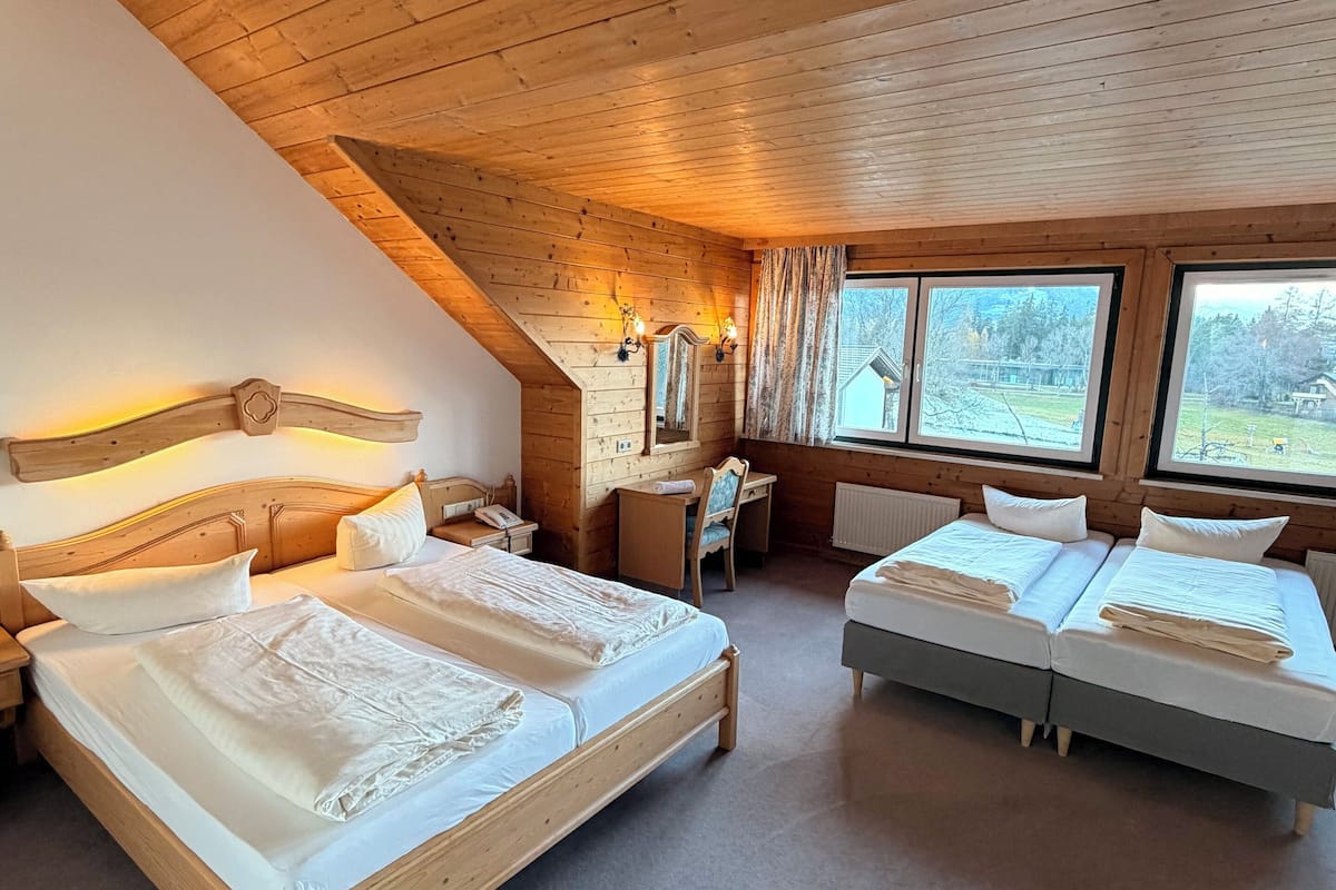 Standard Quadruple Room, Balcony, Mountain View | 1 bedroom, individually decorated, individually furnished, soundproofing