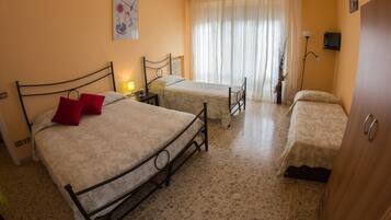 Basic Quadruple Room, Shared Bathroom | 1 bedroom, Select Comfort beds, individually furnished, desk
