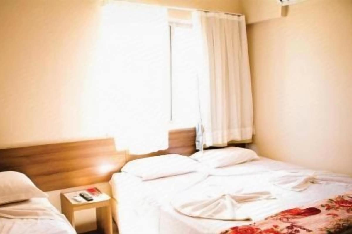 Minibar, blackout drapes, WiFi (free), bed sheets