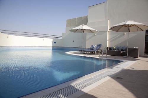 Outdoor pool, pool umbrellas, pool loungers