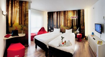 Habitación estándar, 2 camas individuales | Sistema de insonorización y tabla de planchar con plancha