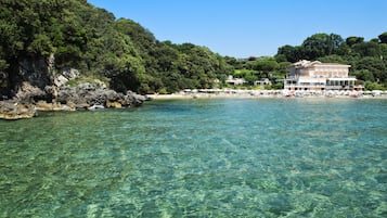 Private beach, sun-loungers, beach umbrellas, snorkelling