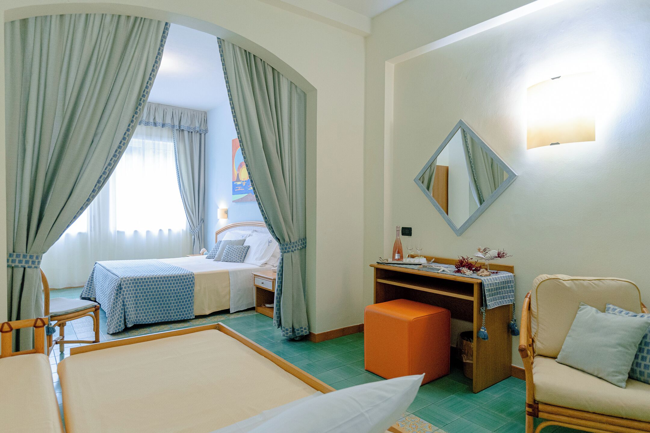 Family Quadruple Room, Garden View | Minibar, in-room safe, desk, free WiFi