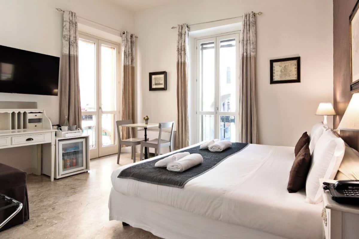 Junior Suite, City View | Down duvets, in-room safe, desk, blackout curtains