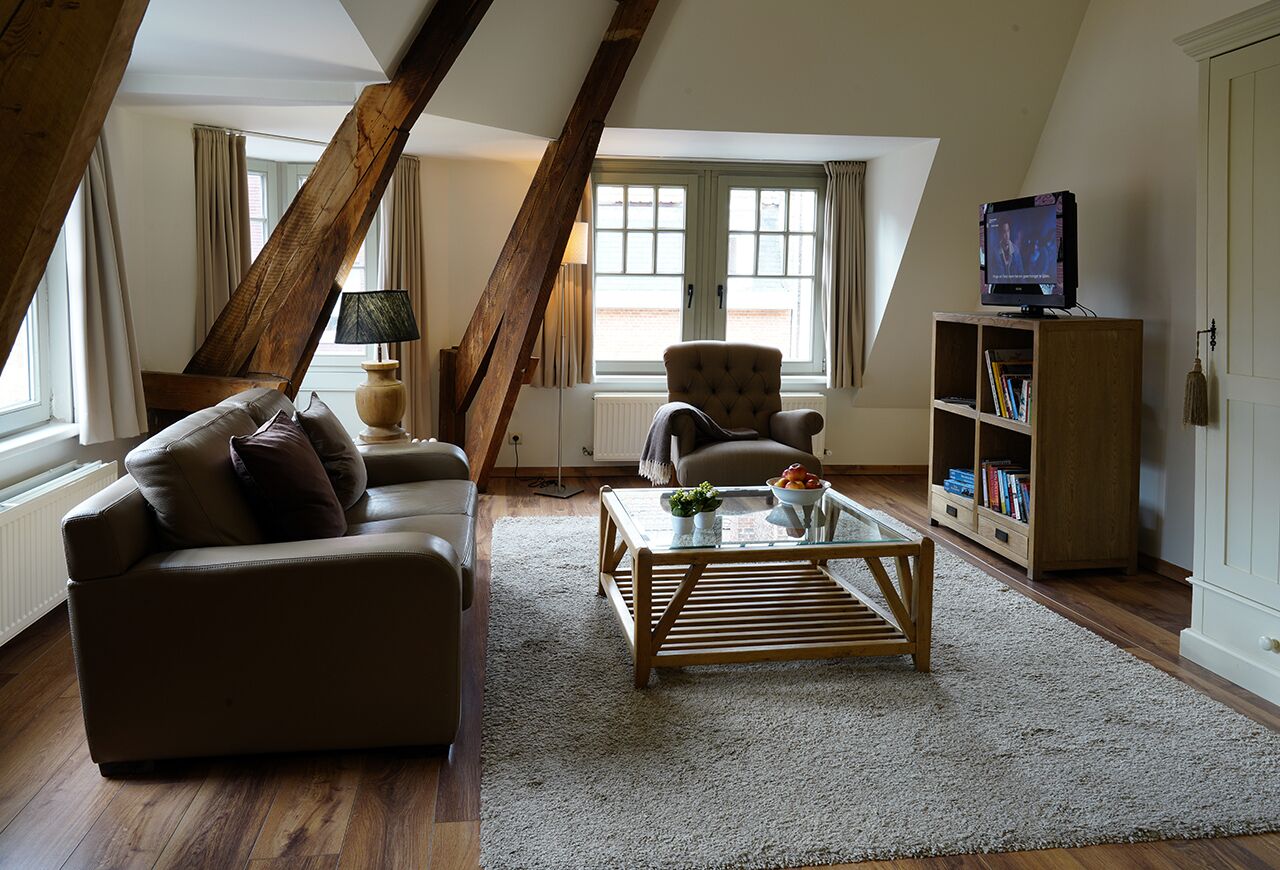 Apartment, 1 Bedroom | Living area | Flat-screen TV, DVD player