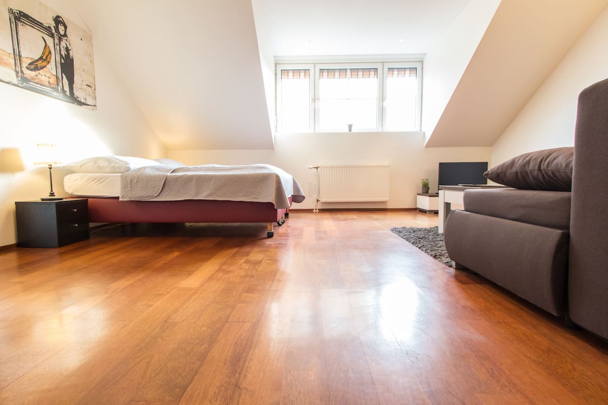 Appartamento, 2 camere da letto | Area soggiorno | TV a schermo piatto