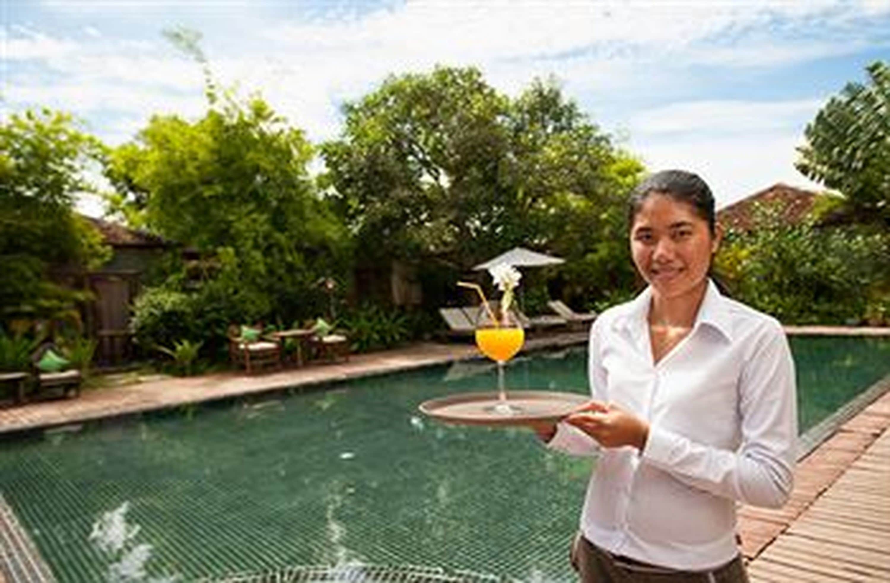 outdoor pool, pool umbrellas, pool loungers