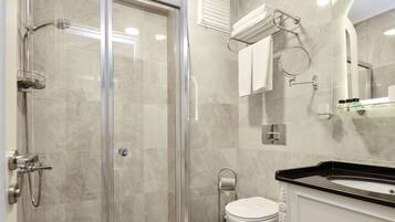 Shower, free toiletries, hair dryer, slippers